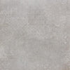 Detail van het matte oppervlak van keramische tegel Pora Grigio Decor met subtiel reliëf, geschikt voor vloerverwarming.