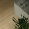 Lichtbruin keramisch parket in wildverband motief, perfect voor moderne interieurs. Realistische houtlook tegel van 26,5x160 cm formaat.